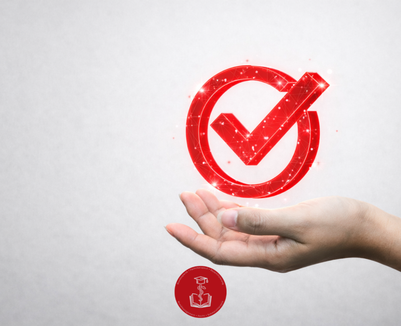 Hand über der ein roter Haken schwebt.